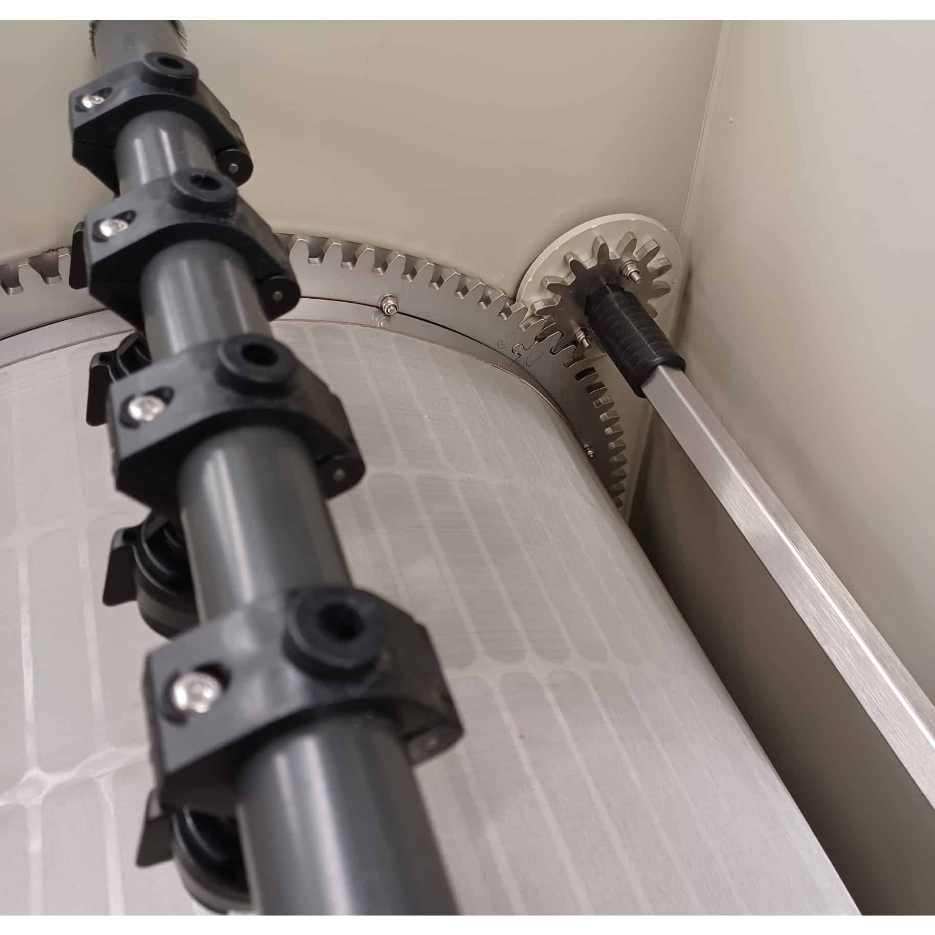 Close-up view of the stainless steel gears and fine mesh screen used in Burtons Drum Filters, ensuring high-efficiency mechanical filtration for koi ponds.