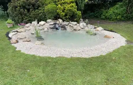 Natural Wildlife Pond Built by That Pond Guy in Kent Using Cotswold Stones A beautiful wildlife pond built by That Pond Guy in Kent, using Cotswold stones for an authentic and stunning finish.