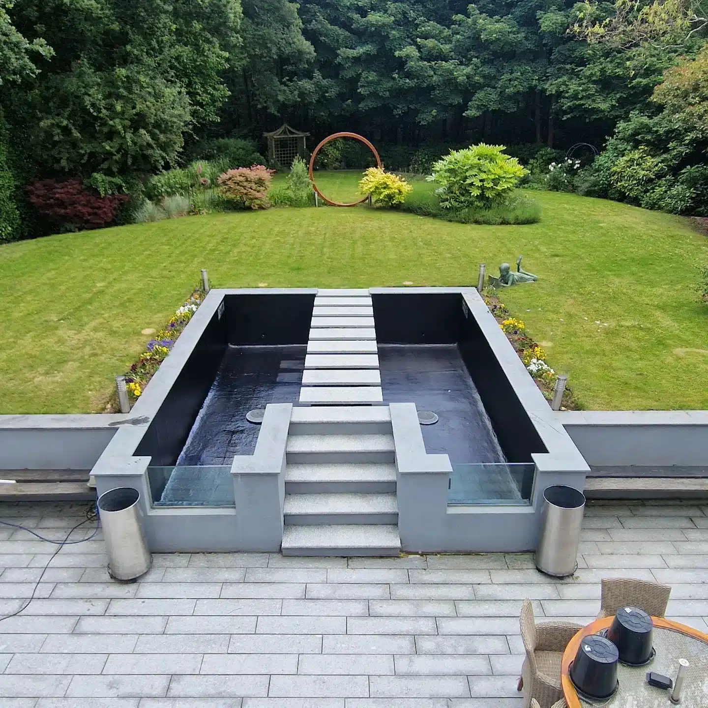 Completed fibreglass pond with smooth waterproof finish installed by That Pond Guy