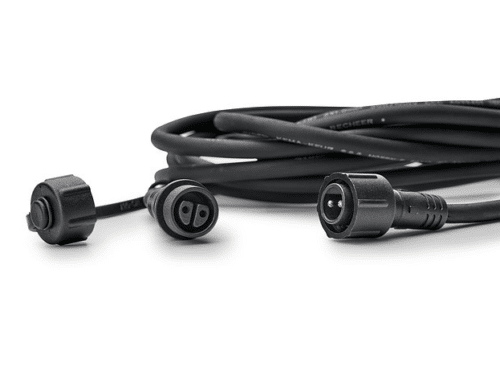 A close-up view of the Oase LunAqua Connect Extension Cable 5m, showcasing its IP67-rated waterproof connectors and blanking caps, ensuring a safe and reliable extension for LunAqua Connect White LED lighting systems.