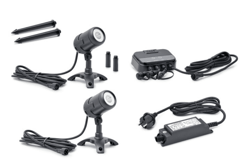 Unboxed LunAqua Connect Starter Set Controllable, featuring LED spotlights, power supply, controller, and cables for garden and pond lighting.