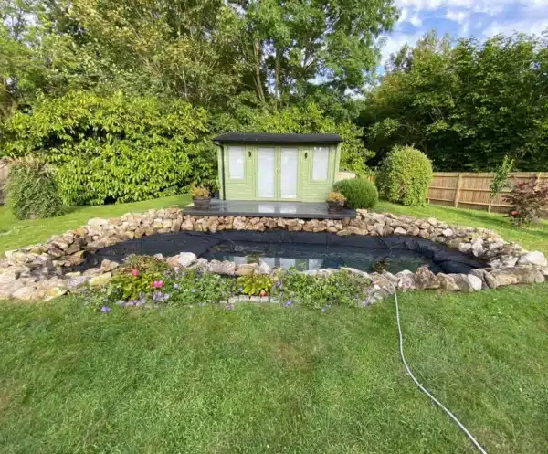 Clean pond after deep cleaning with clear water on the Isle of Sheppey, Swale, Kent