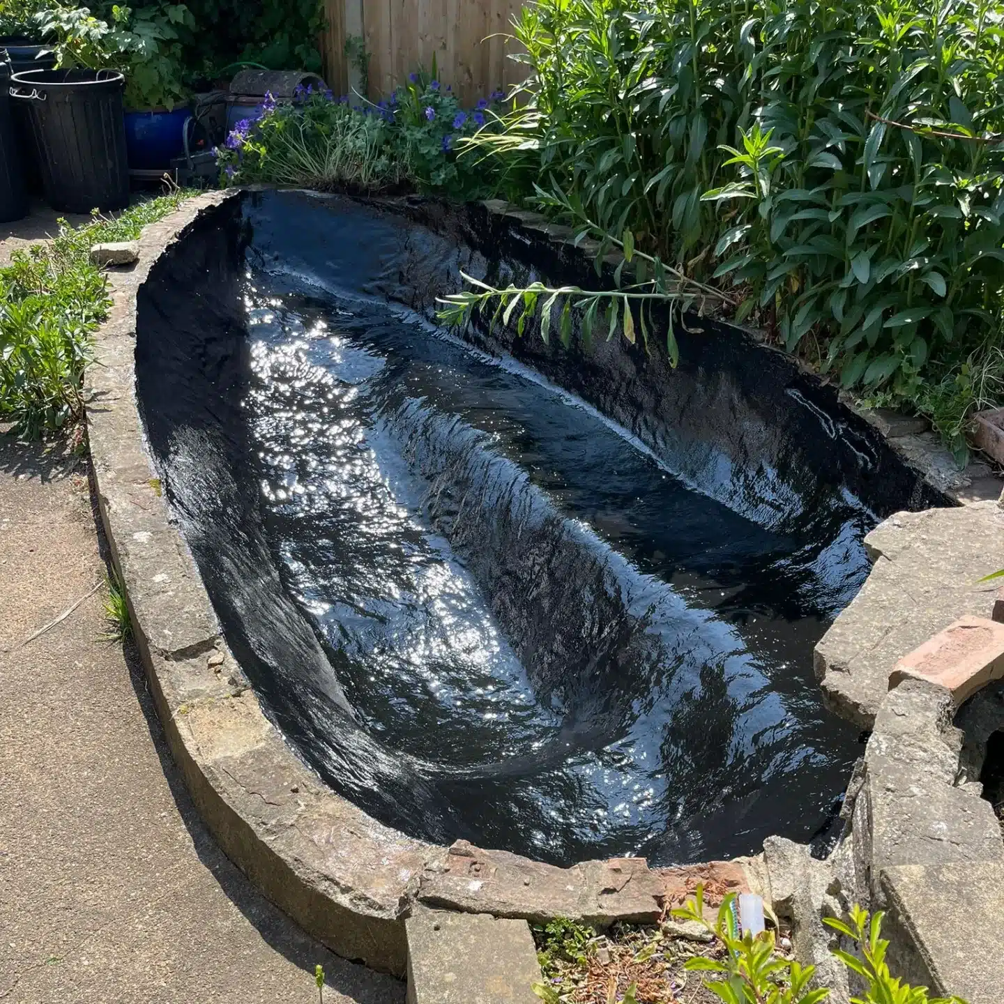Koi pond fibreglassing in Sussex with seamless GRP pond lining