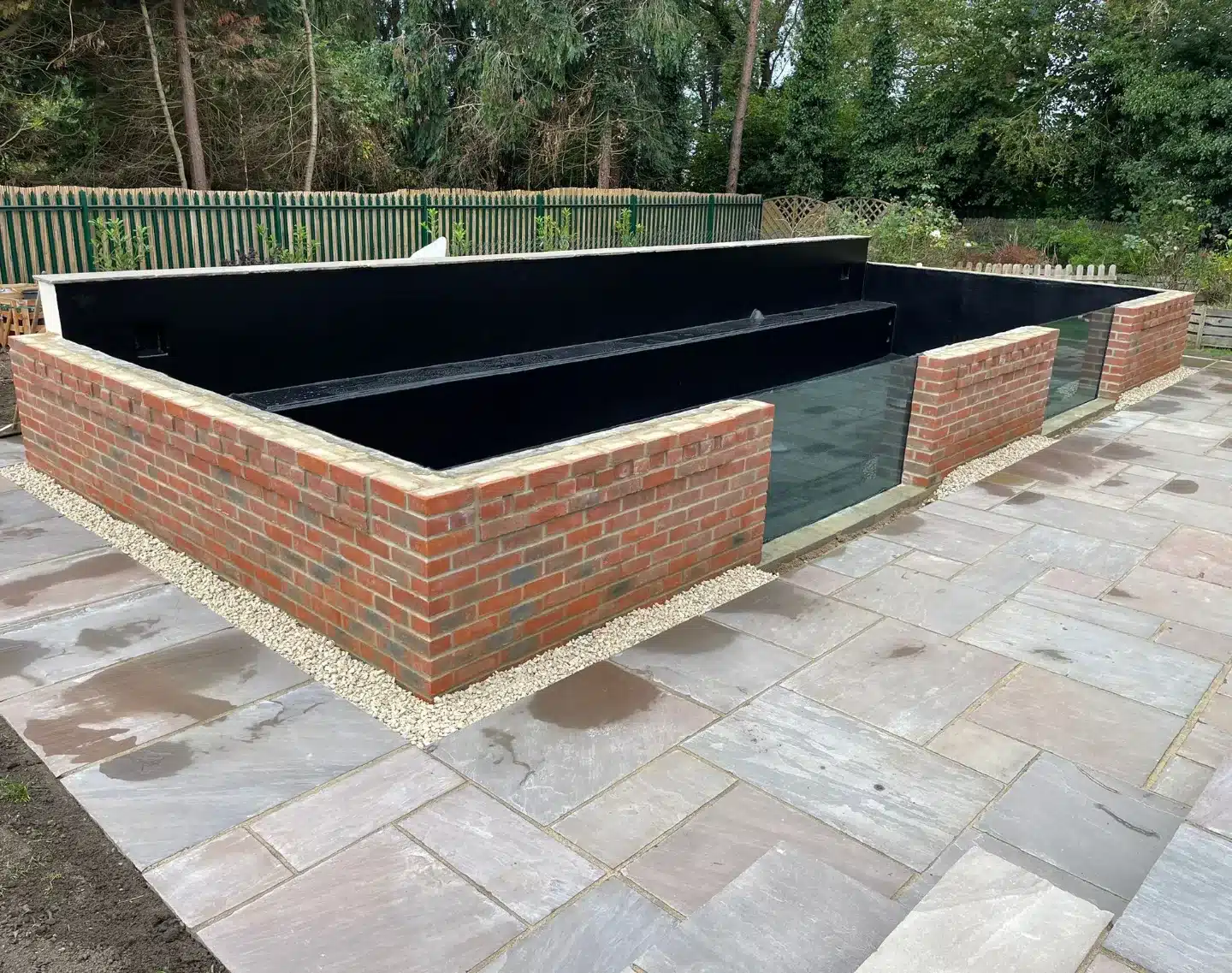 Koi pond fibreglassing in Hertfordshire with seamless GRP pond lining