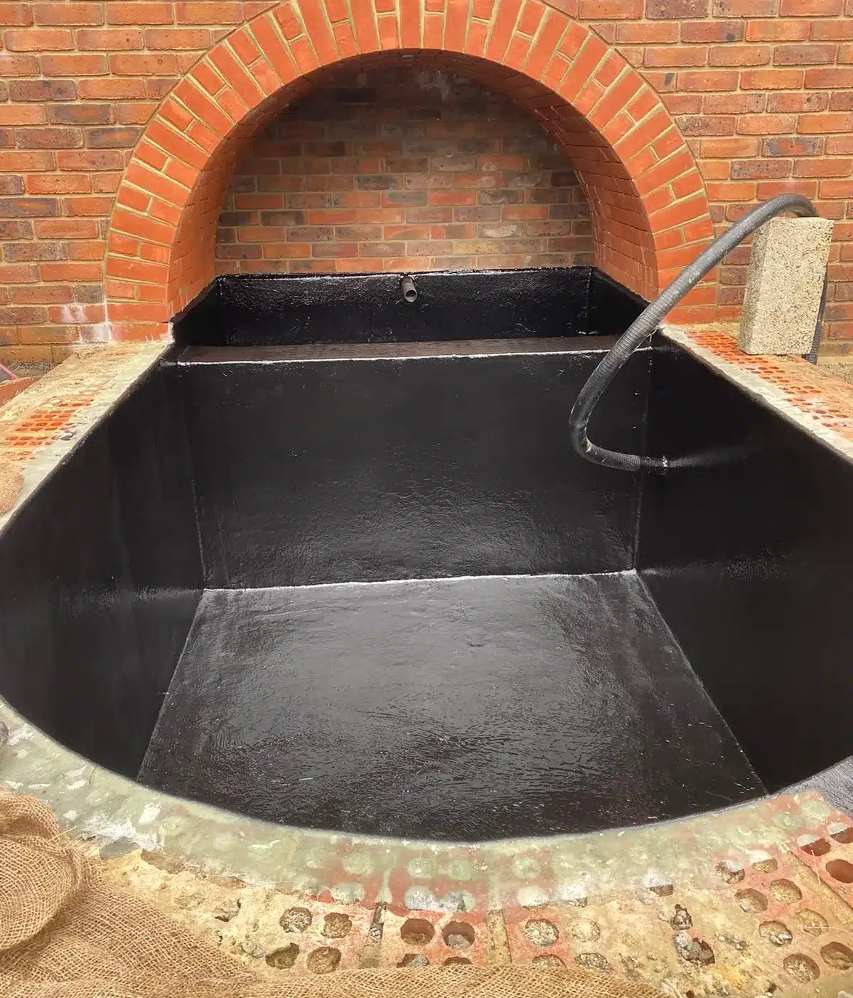 Bespoke fibreglass pond lining in Hertfordshire with smooth waterproof finish