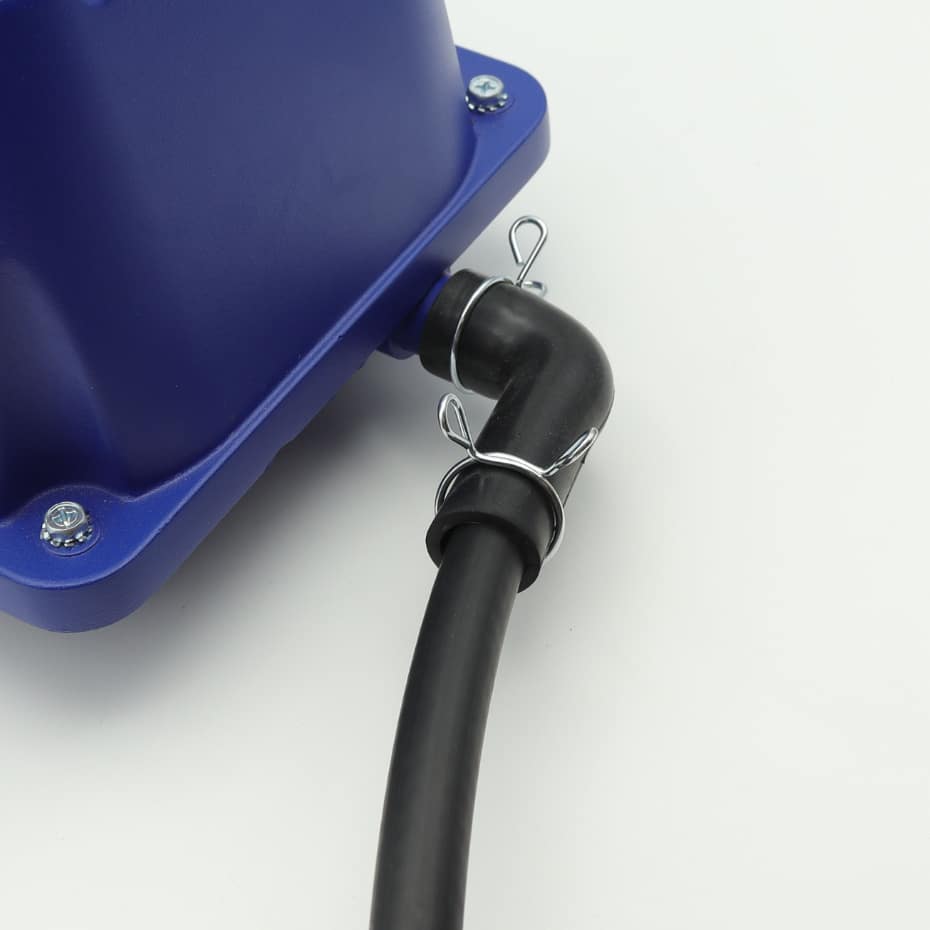 Evolution Aqua Airpump rubber outlet elbow fitted between the pump and sinking airline, with retaining clips shown