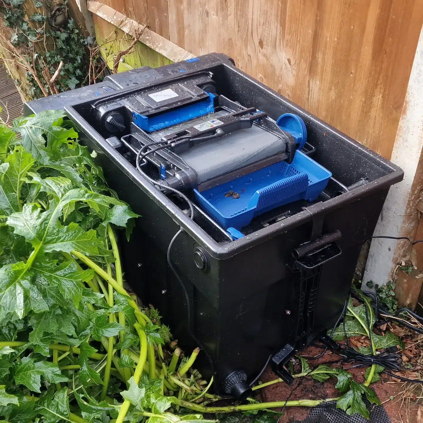 Replacement ScreenMatic 90000 with open screen and tray during a filter upgrade